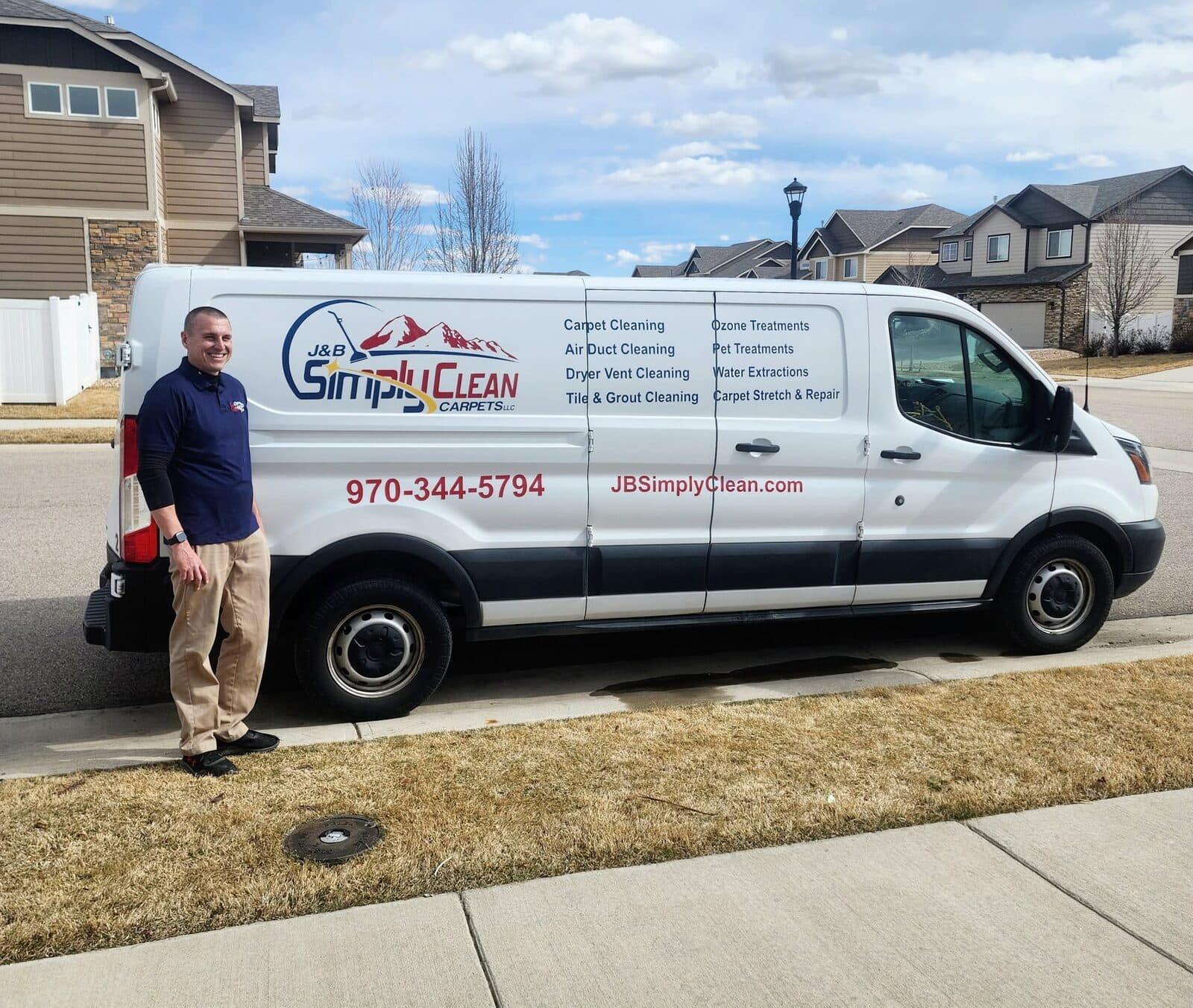 J & B Simply Clean Carpets service van in a Northern Colorado neighborhood